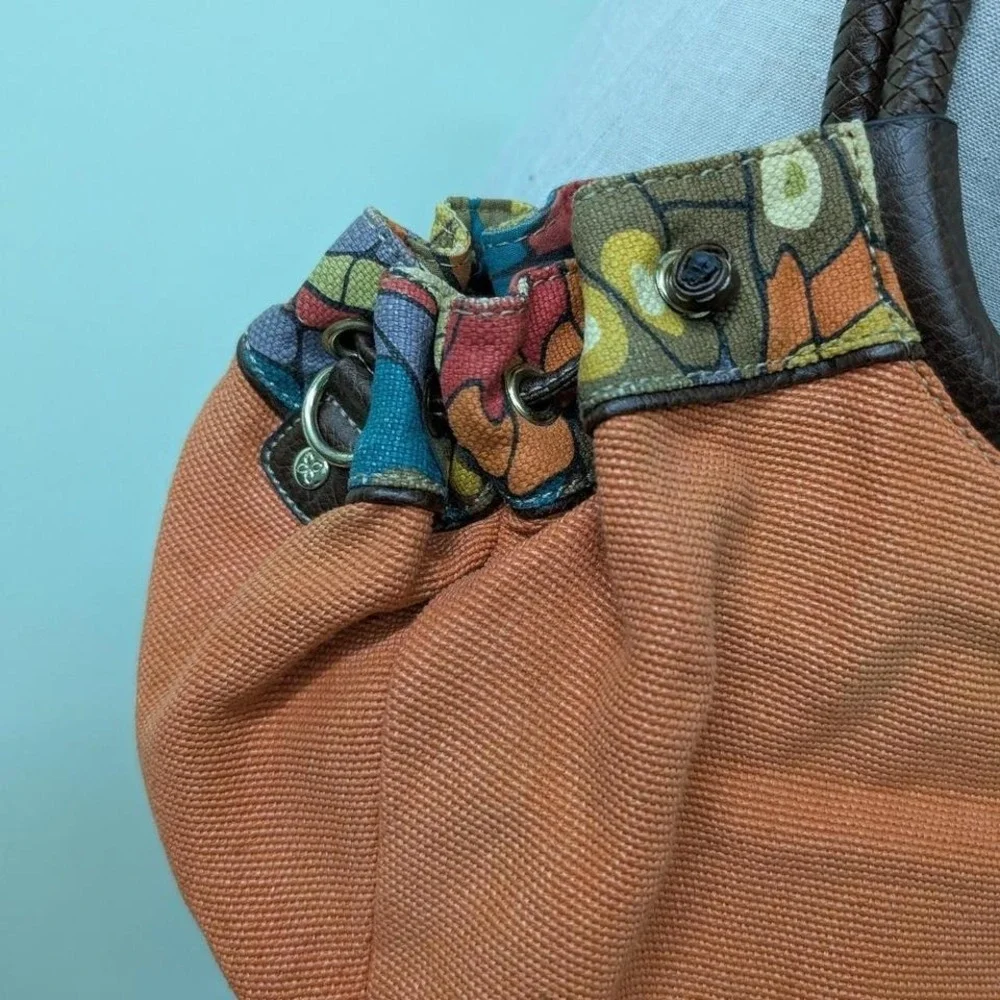Relic orange‎ canvas purse with brown leather trim and colorful fabric